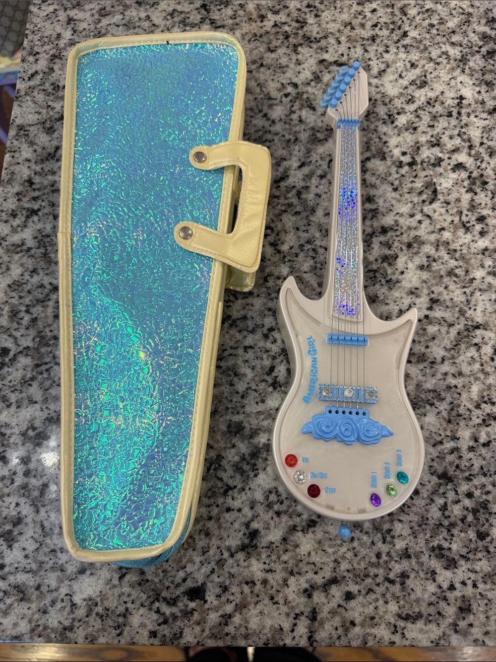 American Girl Iridescent Teal Case with White and Light Blue Toy Guitar